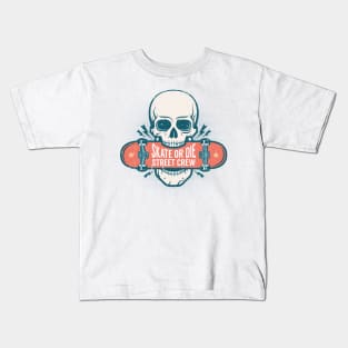 Skull holds a skateboard in his teeth Kids T-Shirt